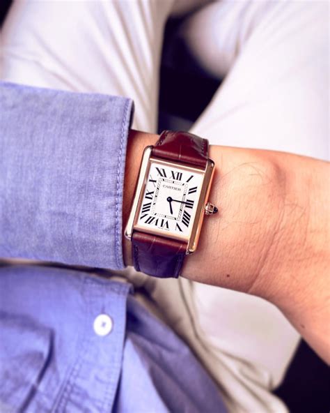 cartier tank on wrist